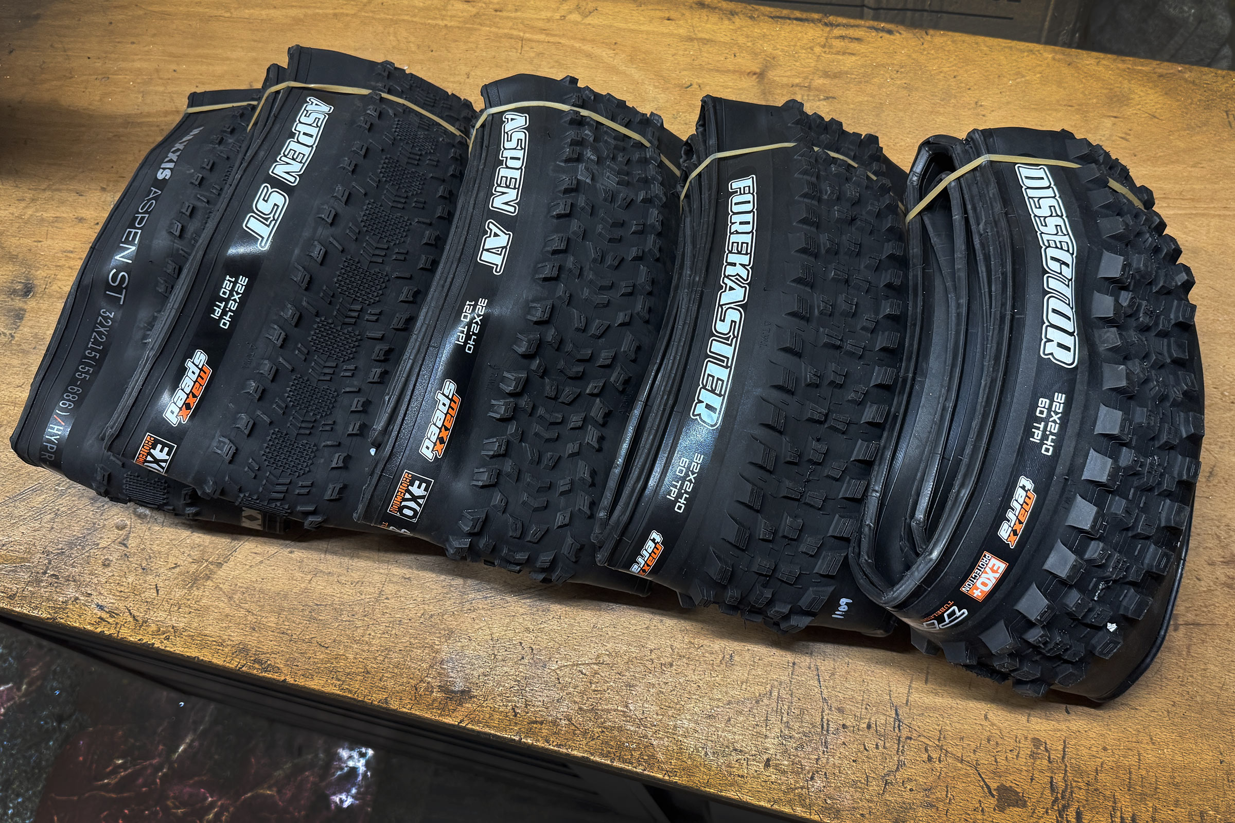 five 32" Maxxis gravel & mountain bike tires: Aspen ST, Aspen AT, Forekaster & Dissector